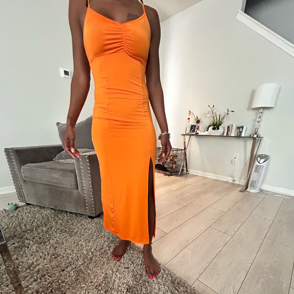 Never worn dress with split. Great for summer!
